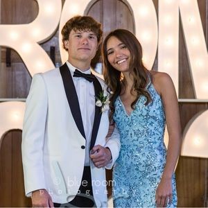 This beautiful blue beaded prom dress. Worn only once